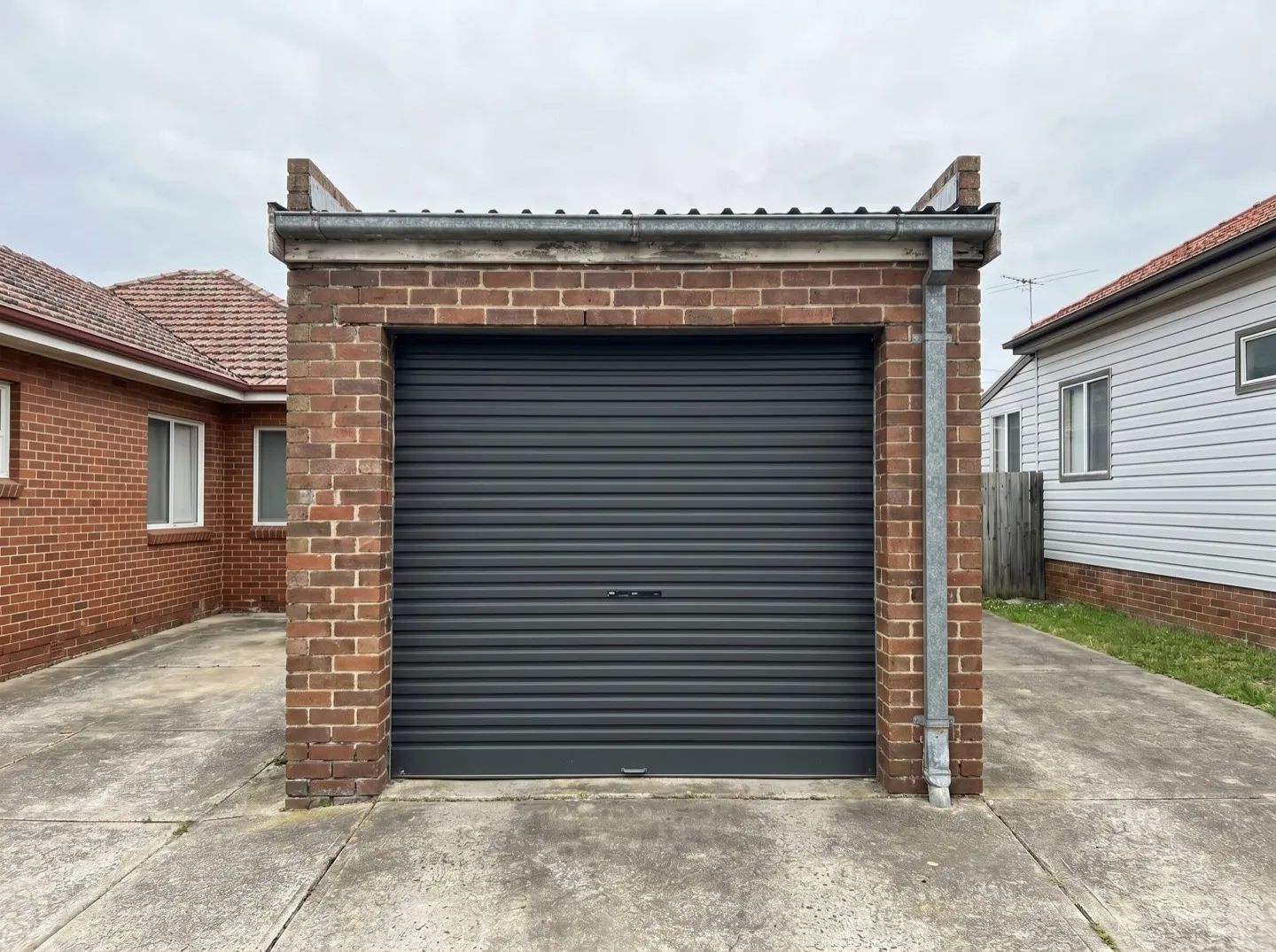 A corrugated steel roller garage door